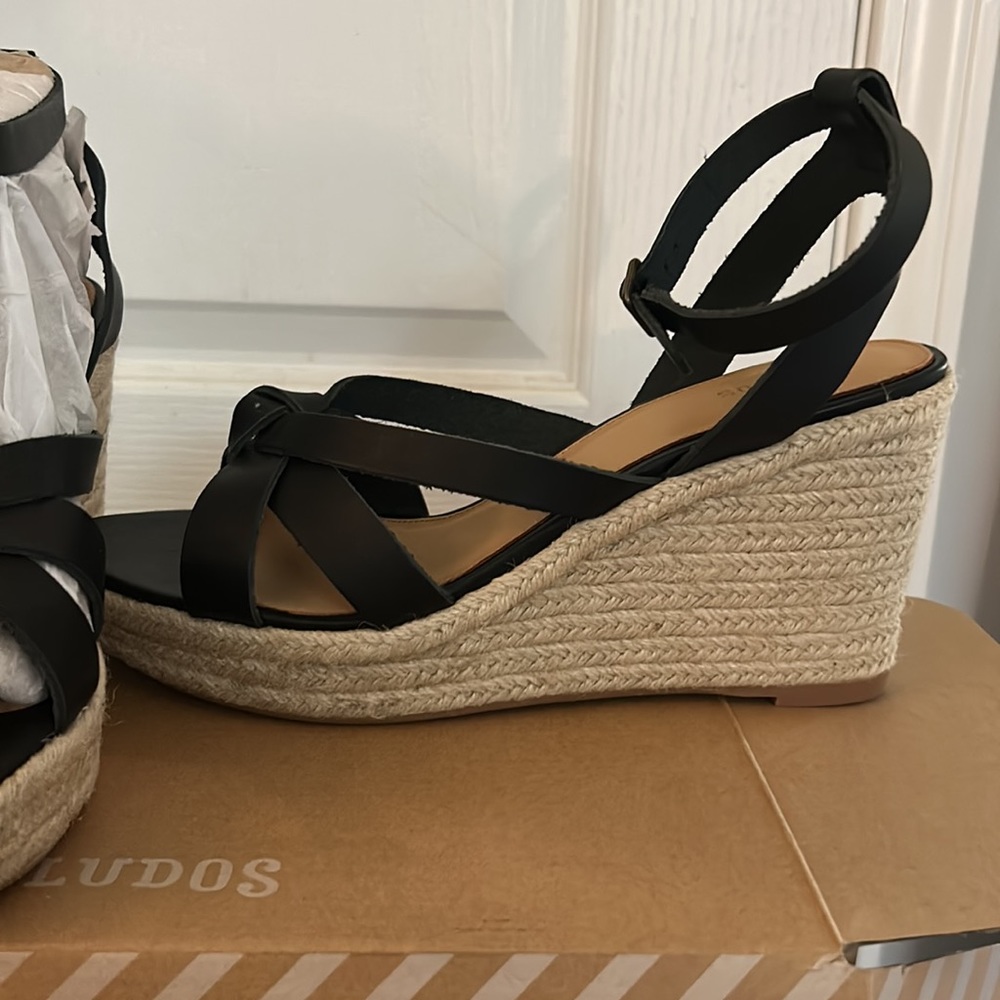 Black leather espadrilles.